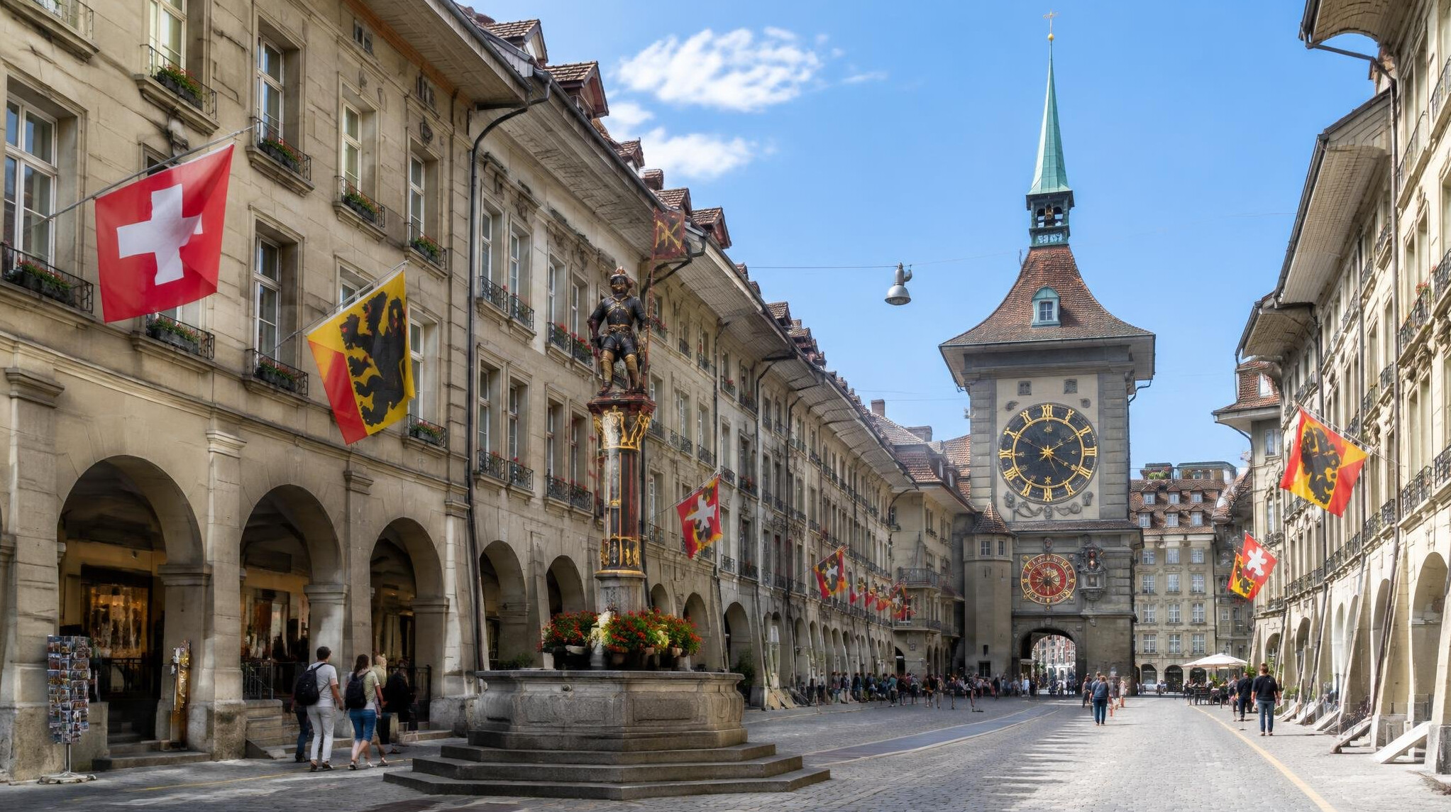 Historic clock tower and old town street in Bern, Switzerland